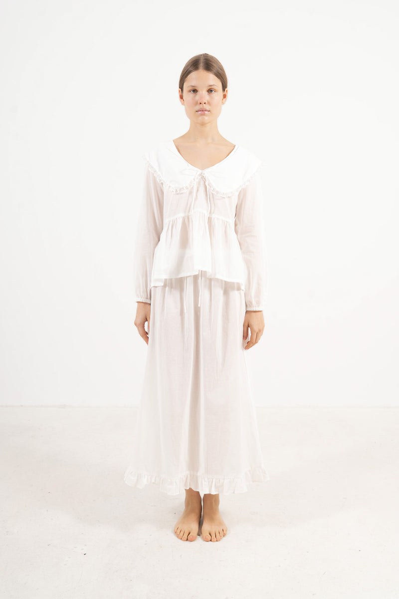 Front view studio portrait featuring a model in the Élodie set by MOCHA, embodying understated femininity and quiet ease.
