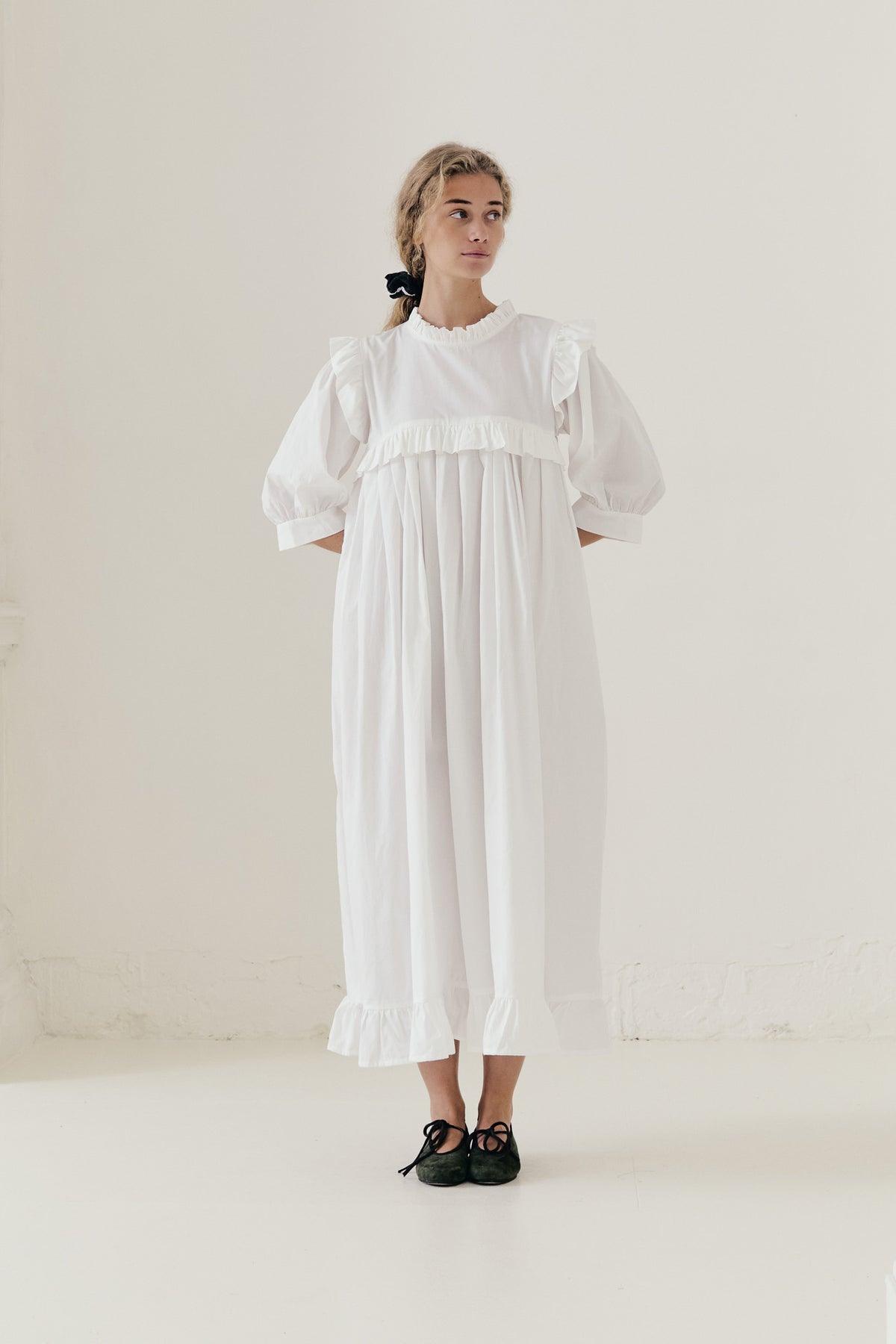 Majestic editorial lookbook image featuring La Robe Monique, embodying pure elegance that whispers of palace halls.