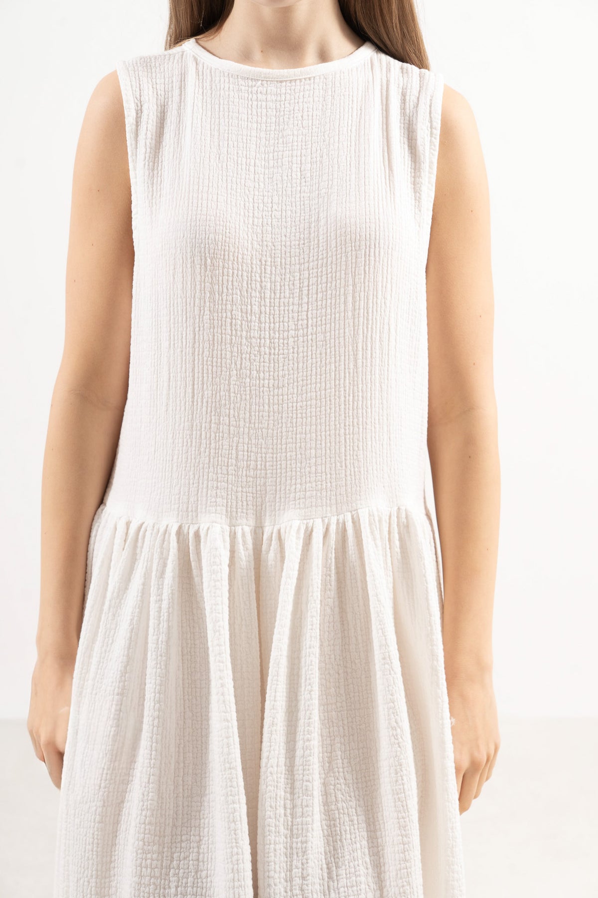 MOCHA Nuage dress close-up fabric shot, showing the high-quality 100% cotton texture and precise stitching.