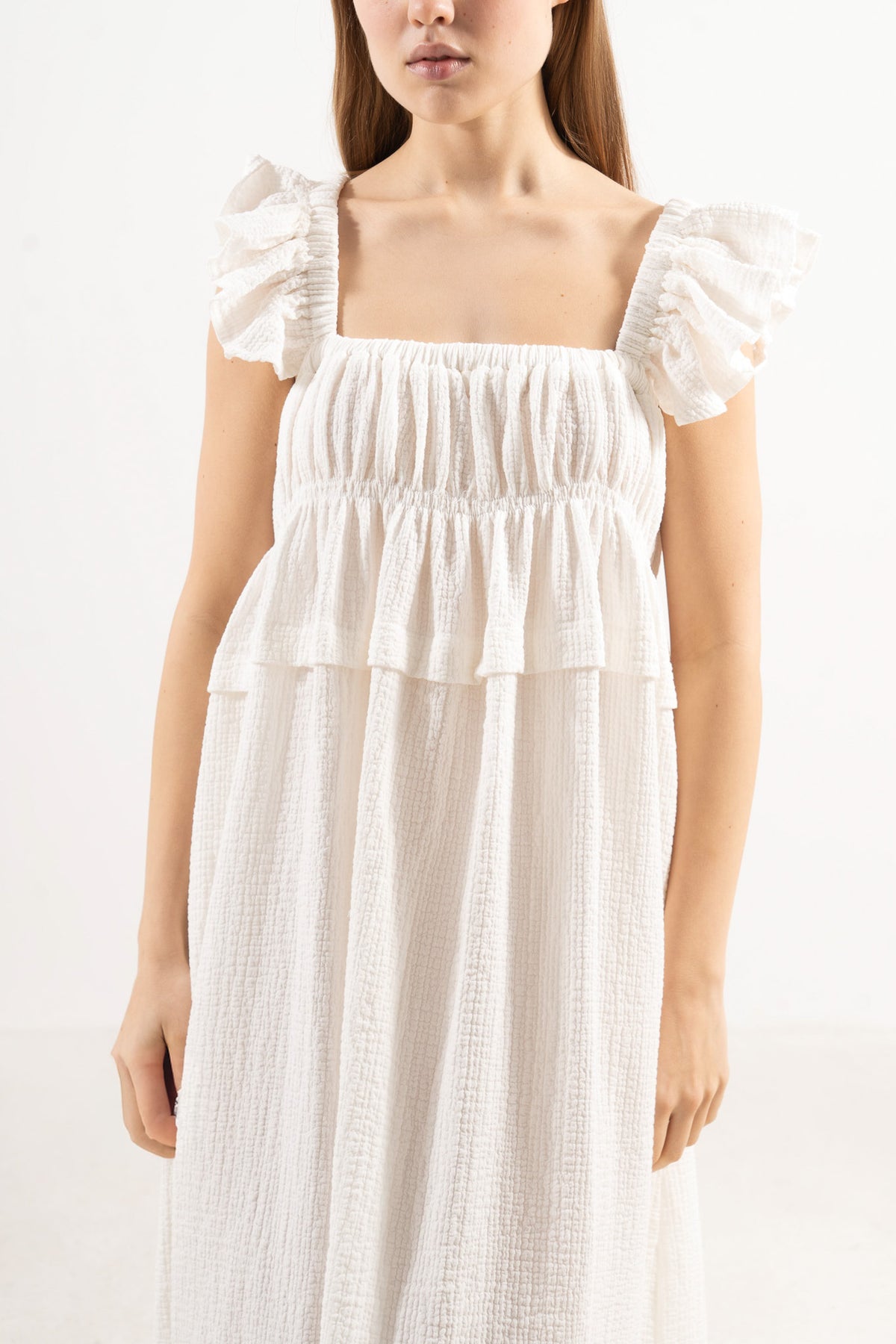 Detailed close-up of the premium  natural fiber weave on the Chloe Dress by MOCHA.