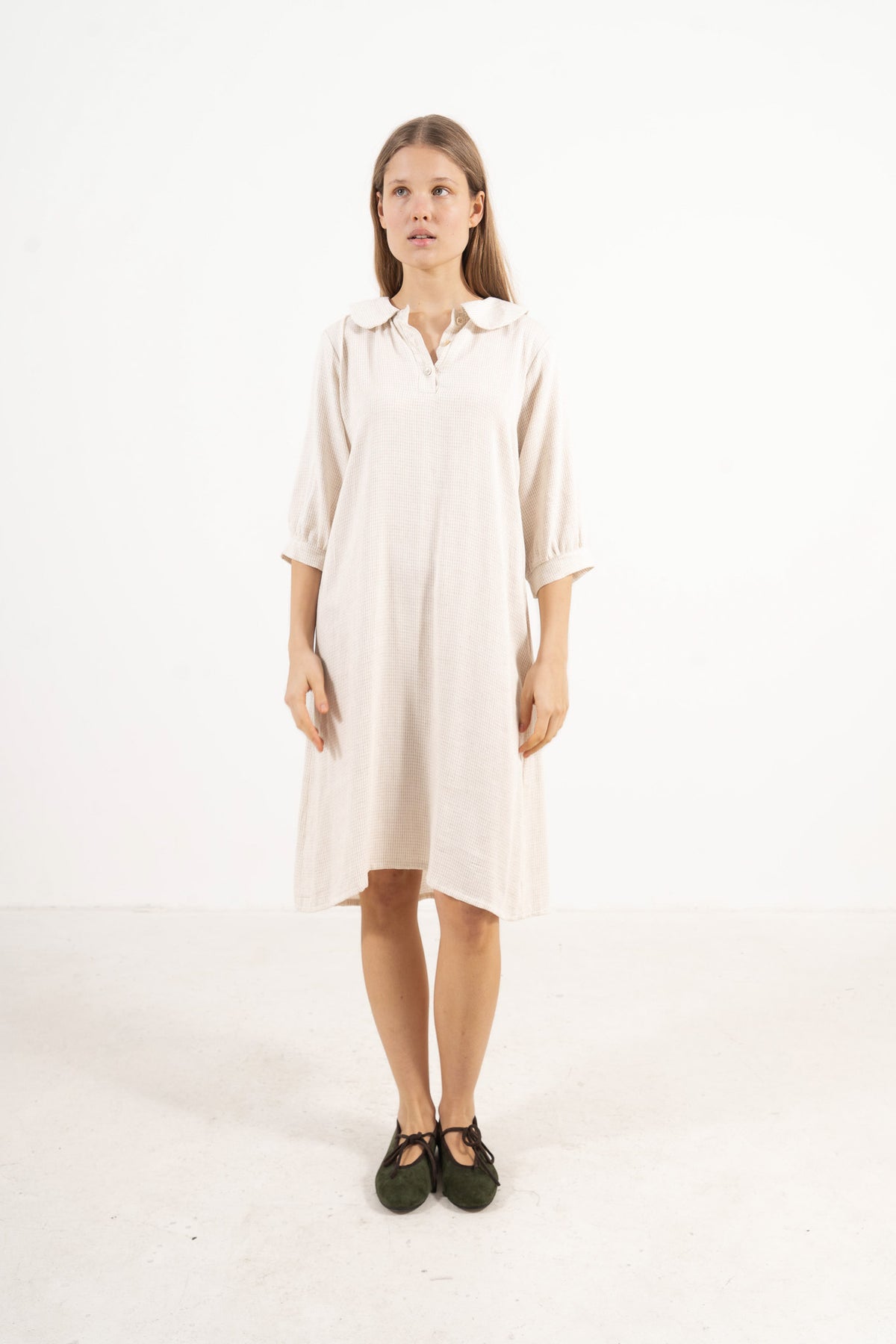 The Mielle Sleeve Dress from the POÈME La Nuit collection by MOCHA, highlighting a clean silhouette and feather-light cotton weave in a front lookbook view.