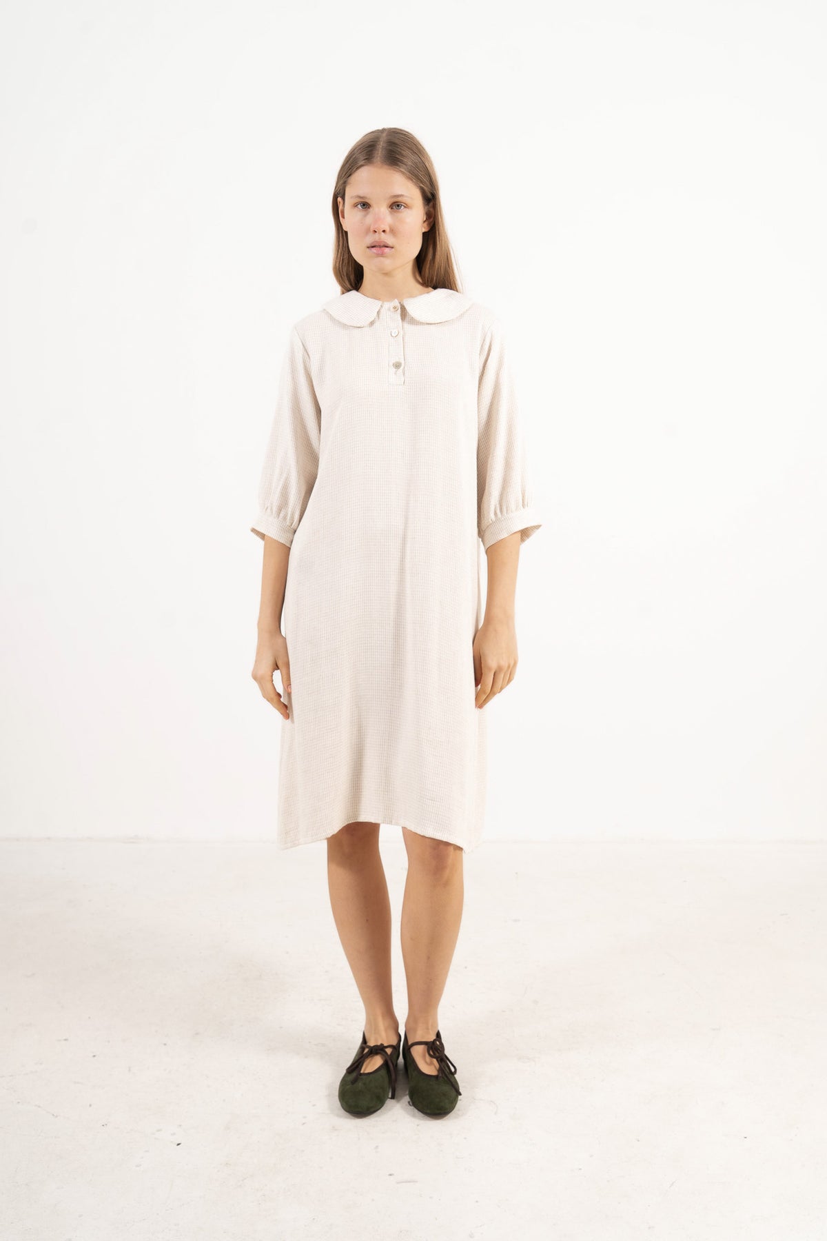 The Mielle Sleeve Dress from the POÈME La Nuit collection by MOCHA, highlighting a clean silhouette and feather-light cotton weave in a front lookbook view.